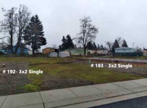 A picture of a vacant lot transformed for 17 new manufactured homes.
