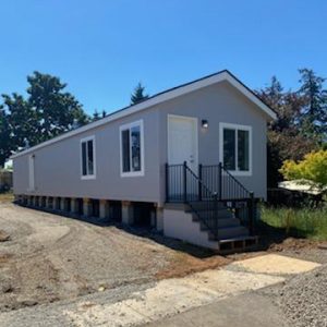 A mobile home is being built on a lot in Clairmont.