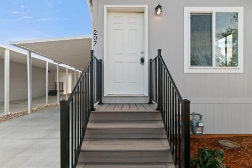 The steps leading up to the front door of a mobile home.