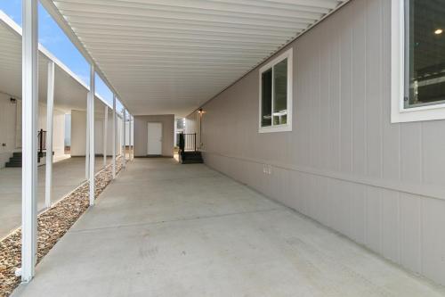 A walkway leading to a mobile home.